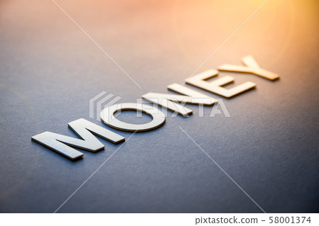 Word money written with white solid letters Word money written with white solid letters 58001374