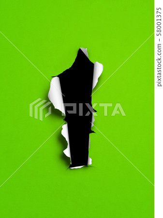 Green torn paper with black hole Green torn paper with black hole 58001375
