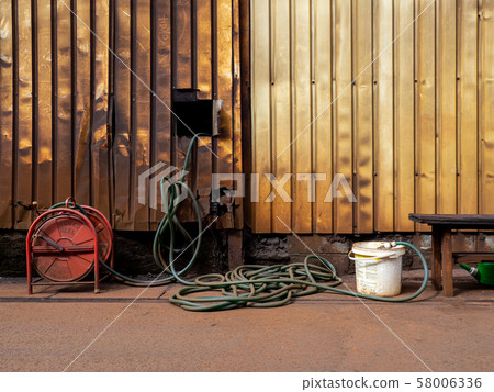 Rusted iron outer wall and hose that makes you feel history Rusted iron outer wall and hose that makes you feel history 58006336