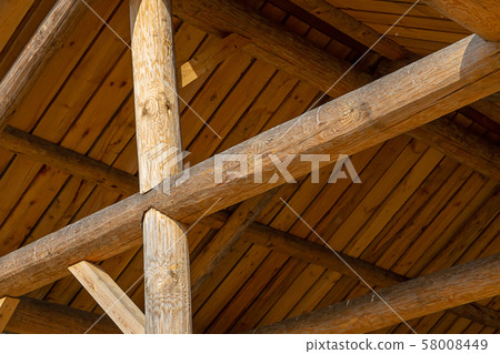 wooden roof crosshair wooden light beige close-up wooden roof crosshair wooden light beige close-up 58008449