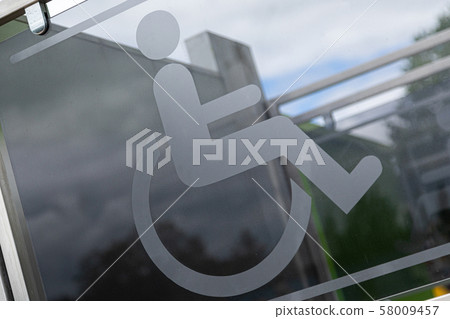 Close-up of sign physically handicapped person in wheelchair 58009457
