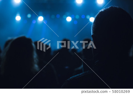 Audience watching the scene with artists. 58010269