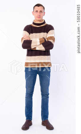 Full body shot of man with arms crossed ready for winter 58010485