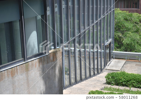 Glass wall. Modern office building exterior with Glass wall. Modern office building exterior with 58011268