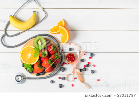 Mixed fresh fruit salad with strawberry with Mixed fresh fruit salad with strawberry with 58011787
