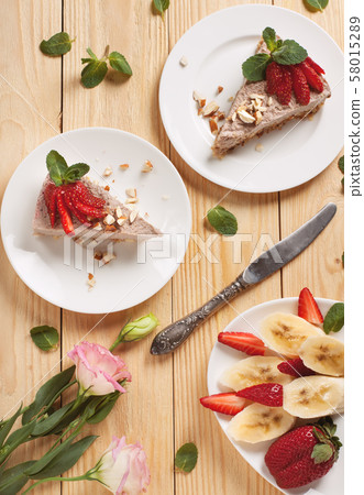 Raw vegan cheesecake with strawberry and banana Raw vegan cheesecake with strawberry and banana 58015289