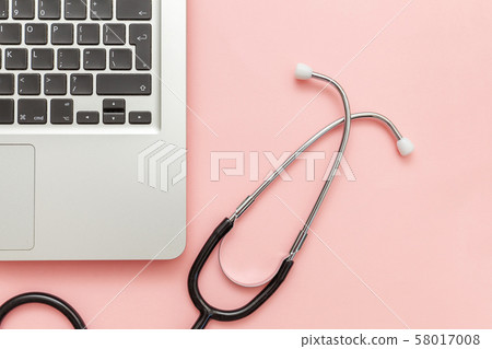 Stethoscope keyboard laptop computer isolated on Stethoscope keyboard laptop computer isolated on 58017008