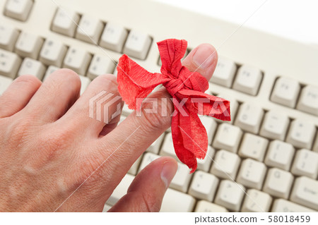 Red bow on finger Red bow on finger 58018459