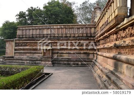 Khajuraho, India, World Heritage Khajuraho Temple, beautiful sculpture building 58019179