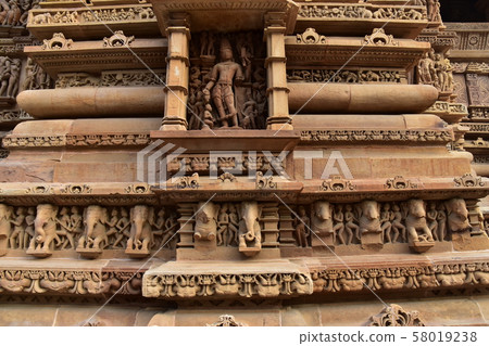 Khajuraho, India, World Heritage Khajuraho Temple, beautiful sculpture building Khajuraho, India, World Heritage Khajuraho Temple, beautiful sculpture building 58019238