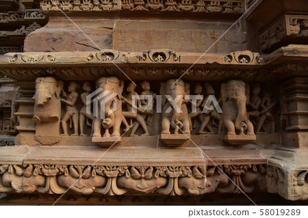 Khajuraho, India, World Heritage Khajuraho Temple, beautiful sculpture building 58019289