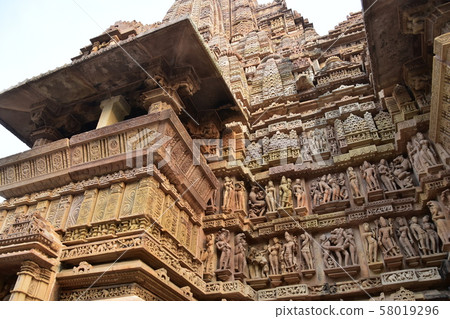 Khajuraho, India, World Heritage Khajuraho Temple, beautiful sculpture building 58019296