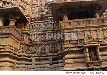 Khajuraho, India, World Heritage Khajuraho Temple, beautiful sculpture building 58019297