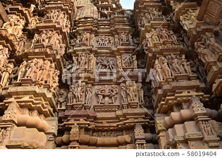Khajuraho, India, World Heritage Khajuraho Temple, beautiful sculpture building Khajuraho, India, World Heritage Khajuraho Temple, beautiful sculpture building 58019404