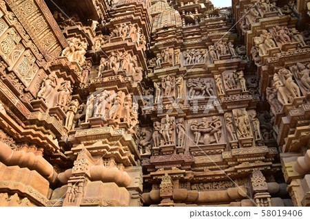 Khajuraho, India, World Heritage Khajuraho Temple, beautiful sculpture building 58019406