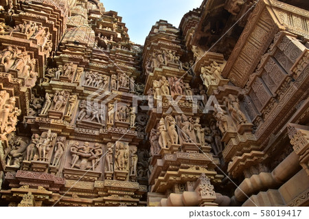 Khajuraho, India, World Heritage Khajuraho Temple, beautiful sculpture building Khajuraho, India, World Heritage Khajuraho Temple, beautiful sculpture building 58019417