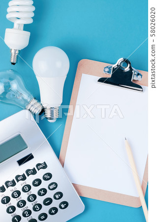Old and new light bulbs. Energy saving concept 58026020