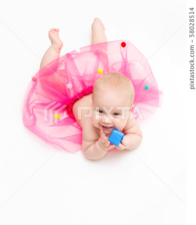 Crawling happy baby isolated on white looking at camera Crawling happy baby isolated on white looking at camera 58028514