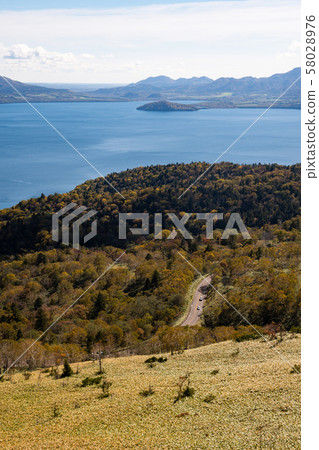 Lake Kussharo and National Route 243 (Hokkaido, Teshikaga) seen from Bihoro Pass in autumn Lake Kussharo and National Route 243 (Hokkaido, Teshikaga) seen from Bihoro Pass in autumn 58028976