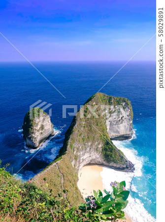 Landscape of beautiful beach. This is the fist time I see T-rex on Kelingking Beach, Nusa Penida, Bali. Royalty high quality stock image of landscape. 58029891