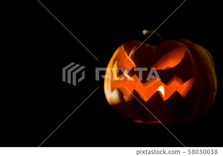 Jack o lantern Halloween on black background with copy space 58030038