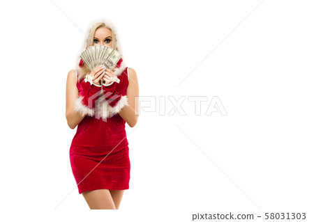 A beautiful sexy girl in a New Year's dress, hold A beautiful sexy girl in a New Year's dress, hold 58031303