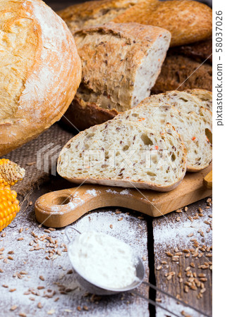 fresh bread and wheat on the wooden fresh bread and wheat on the wooden 58037026