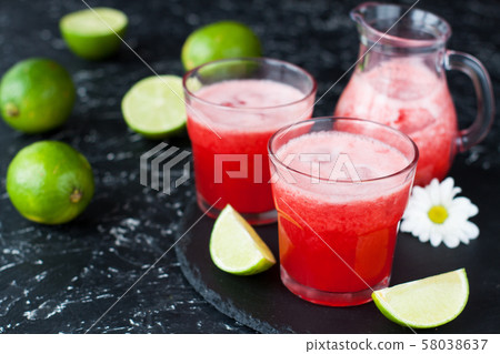 Iced limeade with berries 58038637