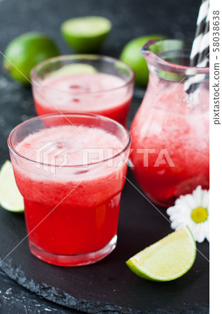 Iced limeade with berries 58038638