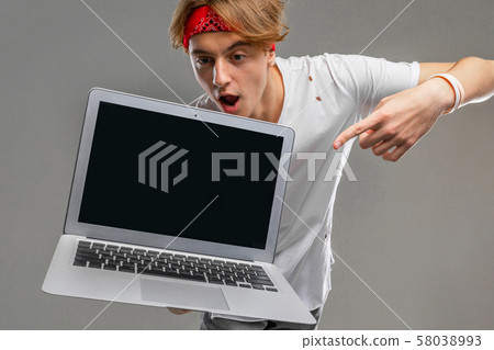 Portrait of student on Gray background for web background design. Gray isolated background. 58038993