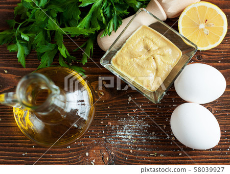 Homemade mayonnaise sauce with fresh vegetables 58039927