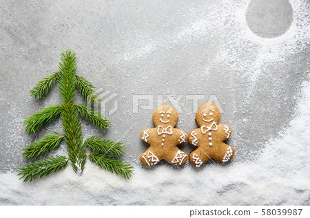 Flat lay of two gingerbread men having a walk on 58039987
