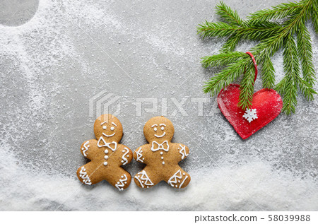 Flat lay at two gingerbread men having a walk on Flat lay at two gingerbread men having a walk on 58039988