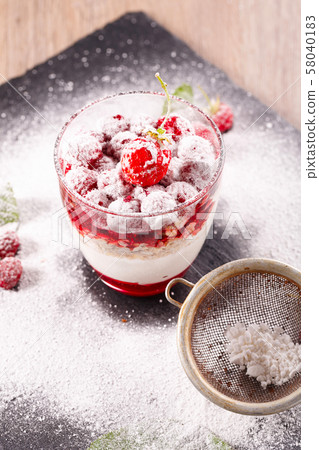 delicious dessert of fresh raspberries and delicious dessert of fresh raspberries and 58040183