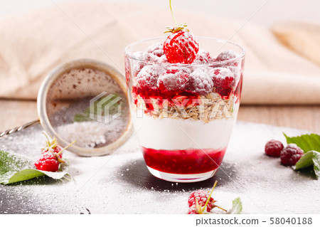 delicious dessert of fresh raspberries and delicious dessert of fresh raspberries and 58040188