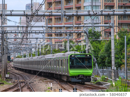 A train approaching Osaki Station in Tokyo, Japan 58040837