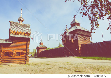 Traditional Siberian wooden house in the Taltsy Architectural-Ethnographic Museum. Traditional Siberian wooden house in the Taltsy Architectural-Ethnographic Museum. 58040978
