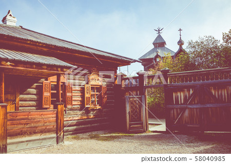 Traditional Siberian wooden house in the Taltsy Architectural-Ethnographic Museum. 58040985