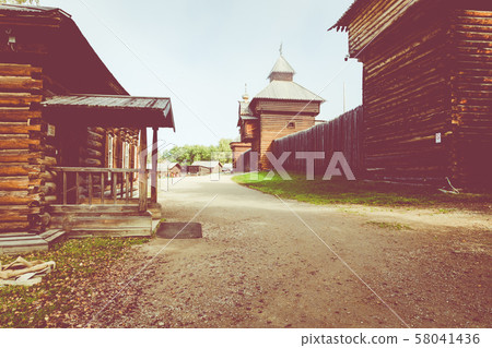 Traditional Siberian wooden house in the Taltsy Architectural-Ethnographic Museum. 58041436