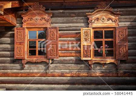 Traditional Siberian wooden house in the Taltsy Architectural-Ethnographic Museum. 58041445