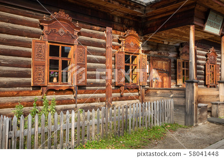 Traditional Siberian wooden house in the Taltsy Architectural-Ethnographic Museum. 58041448