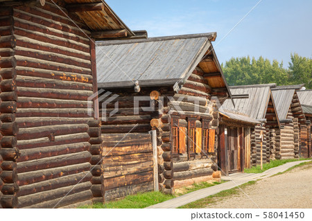 Traditional Siberian wooden house in the Taltsy Architectural-Ethnographic Museum. Traditional Siberian wooden house in the Taltsy Architectural-Ethnographic Museum. 58041450