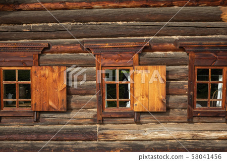 Traditional Siberian wooden house in the Taltsy Architectural-Ethnographic Museum. Traditional Siberian wooden house in the Taltsy Architectural-Ethnographic Museum. 58041456