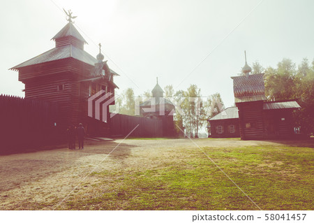 Traditional Siberian wooden house in the Taltsy Architectural-Ethnographic Museum. 58041457