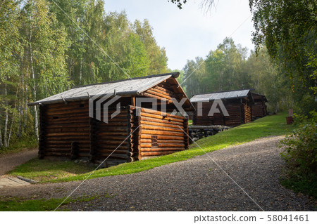 Traditional Siberian wooden house in the Taltsy Architectural-Ethnographic Museum. 58041461
