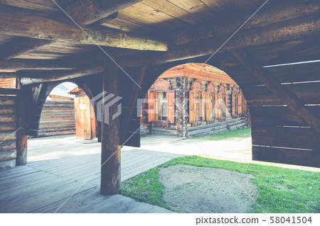 Traditional Siberian wooden house in the Taltsy Architectural-Ethnographic Museum. Traditional Siberian wooden house in the Taltsy Architectural-Ethnographic Museum. 58041504