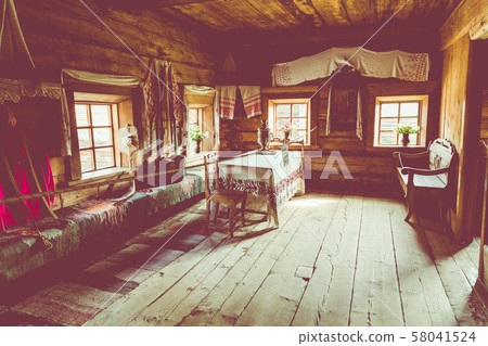 Traditional Siberian wooden house in the Taltsy Architectural-Ethnographic Museum. 58041524