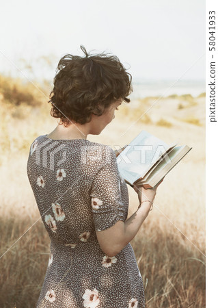 girl reads a book 58041933