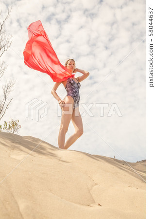 woman with cloak 58044637