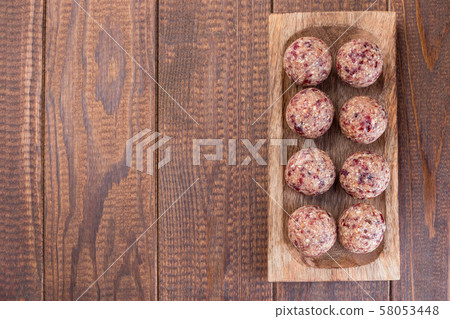 Healthy homemade energy balls with cranberries Healthy homemade energy balls with cranberries 58053448